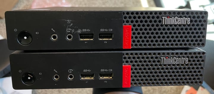 A pair of Lenovo M910q's