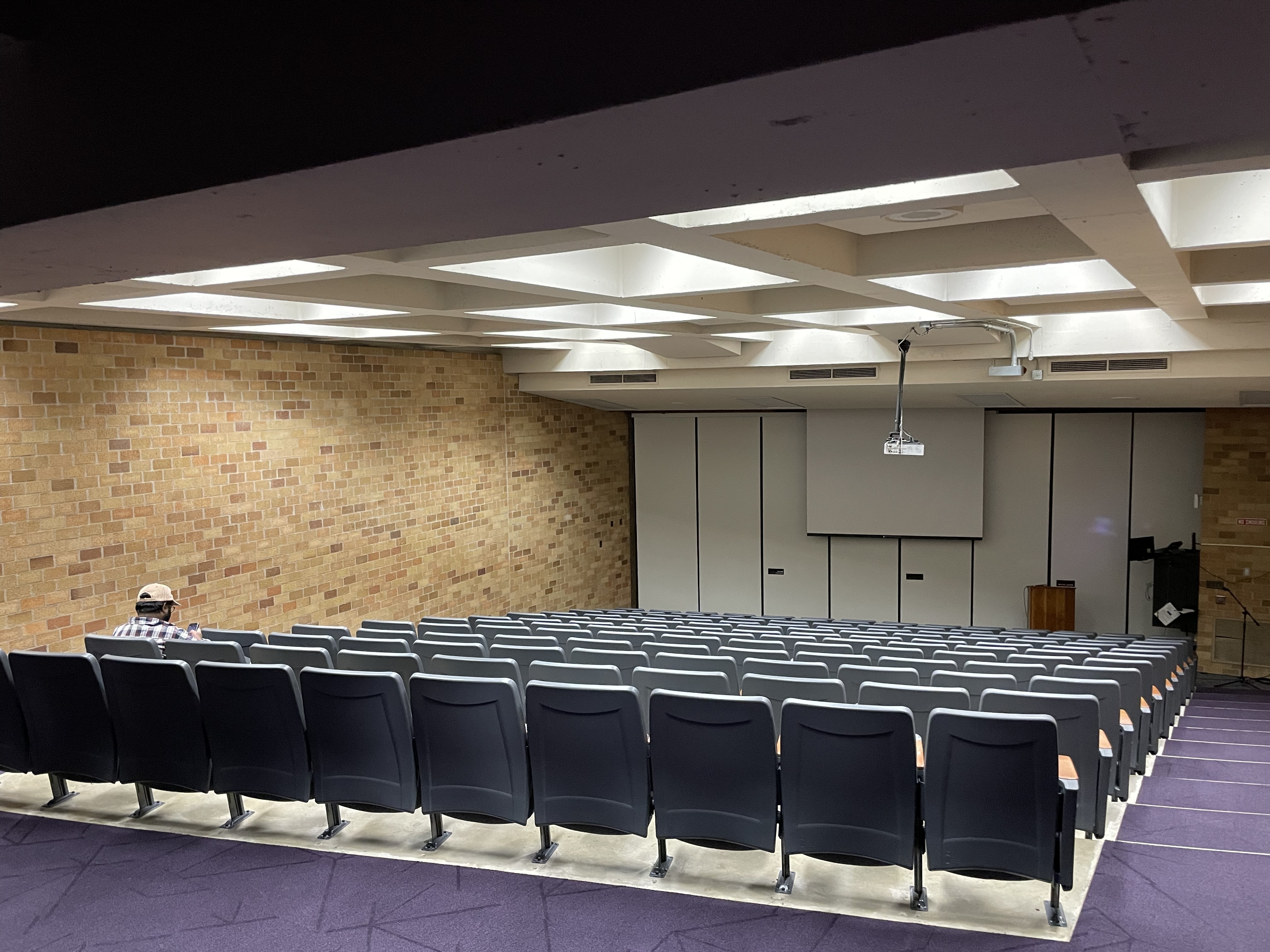 Empty chairs in a conference session room before the talk